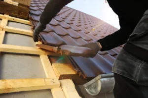 Innovative new roofing tiles being installed on a Naples, Fort Myers, or Bonita Springs Home.